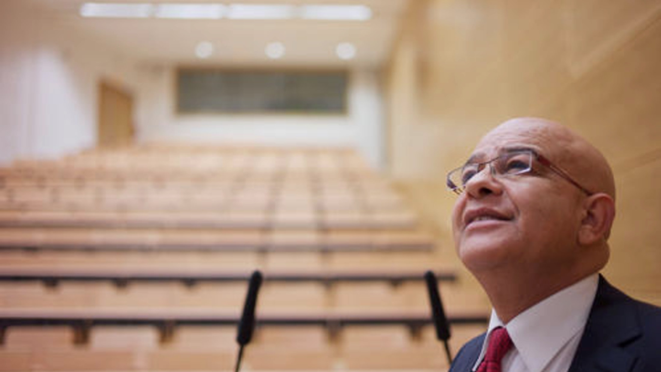 Prof. Youssef Haïkel in front of a university amphitheater